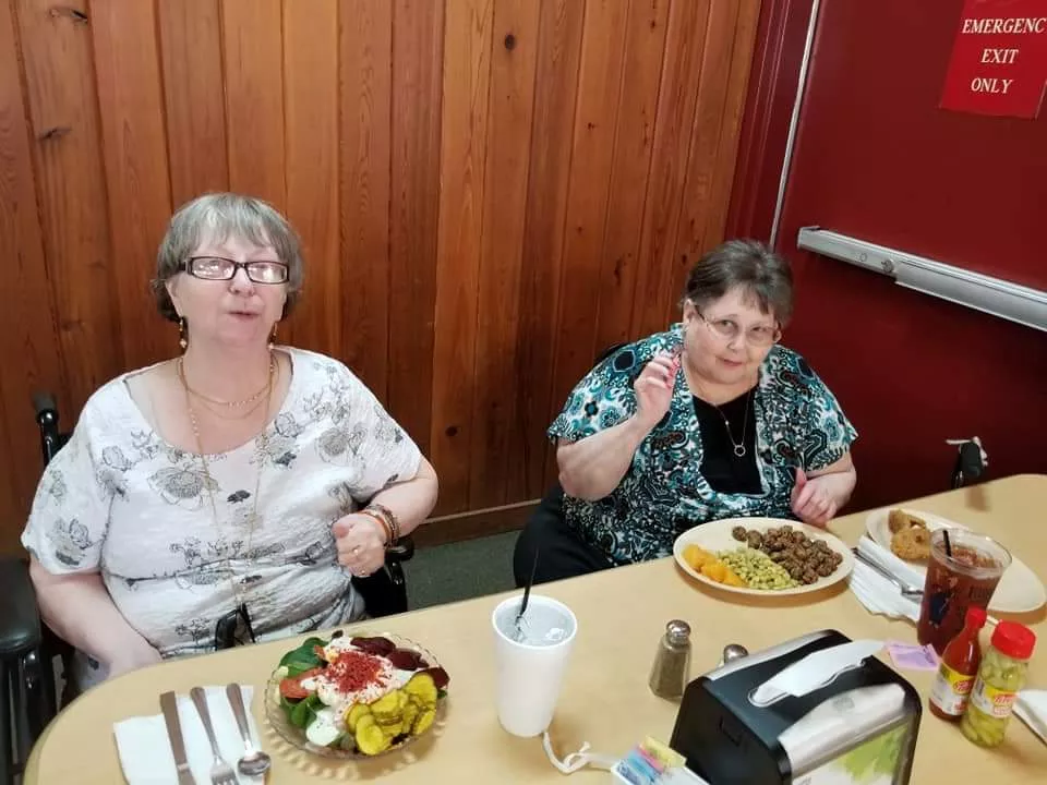 Senior residents enjoying activities at Elite Personal Care Home Centerville GA